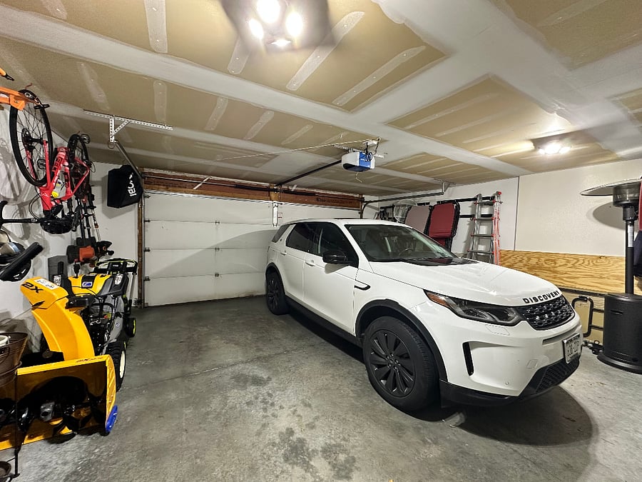 There is plenty of room in the two car garage for your vehicle and this includes a garage door opener