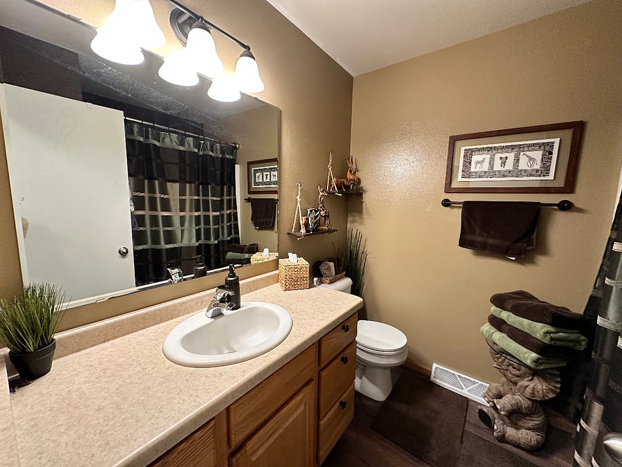 The tenant's full bathroom with large shower and many drawers for storage. This includes towels/washcloths.