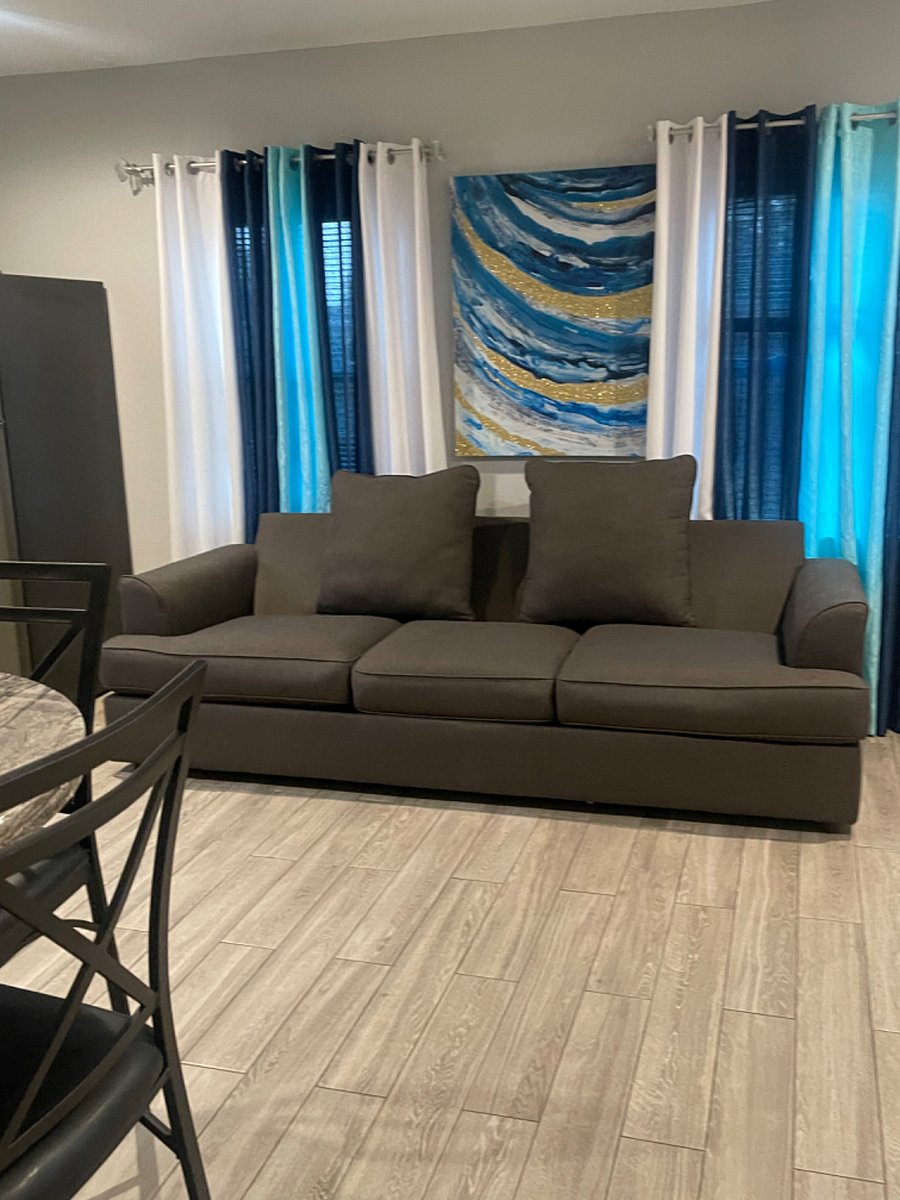 Sofa- has queen size pull out sofa bed