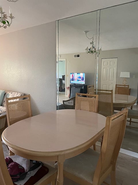 Dining table seats six.  Leaf is in the back of the closet beside the tv.