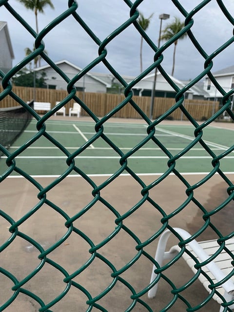 Fenced court.