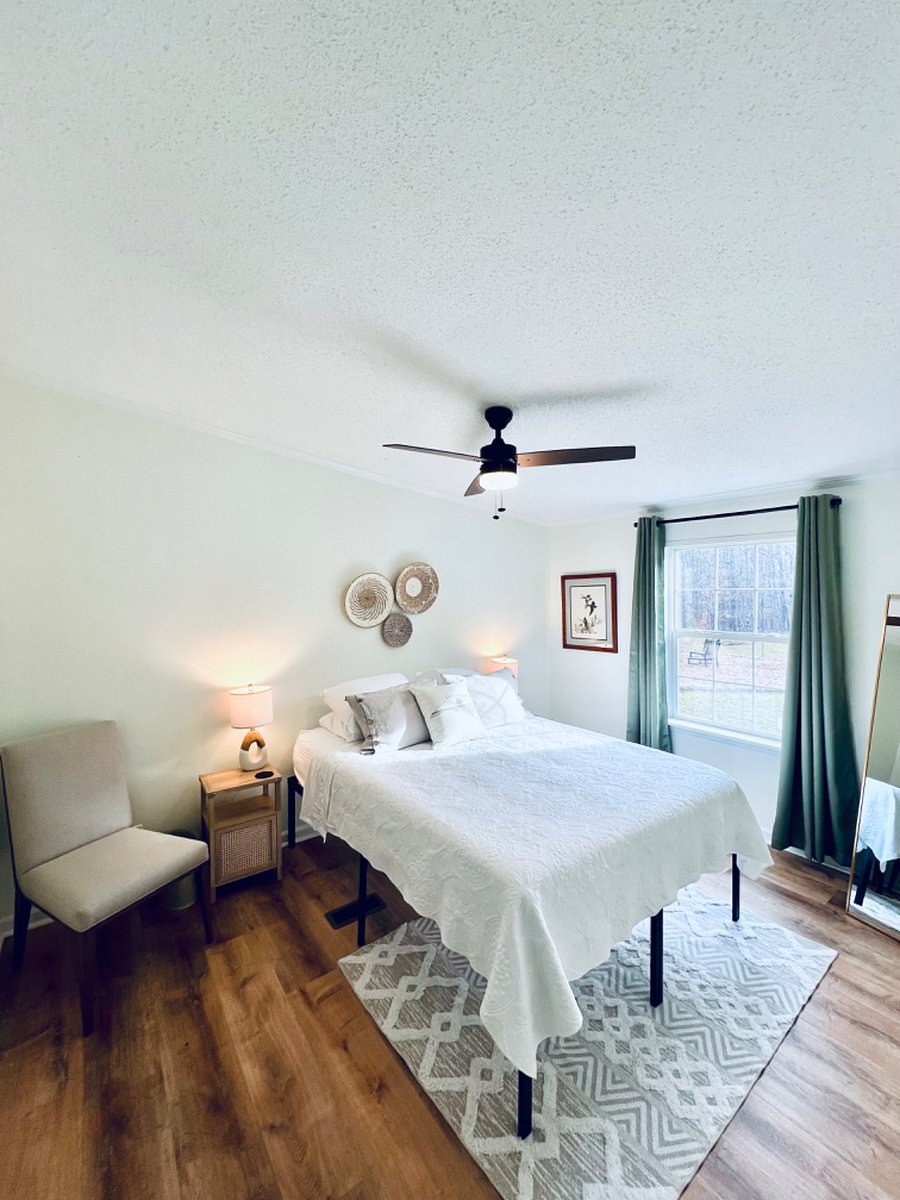 Welcome to the Piedmont Room - with full length mirror, black out curtains, and Queen Bed.