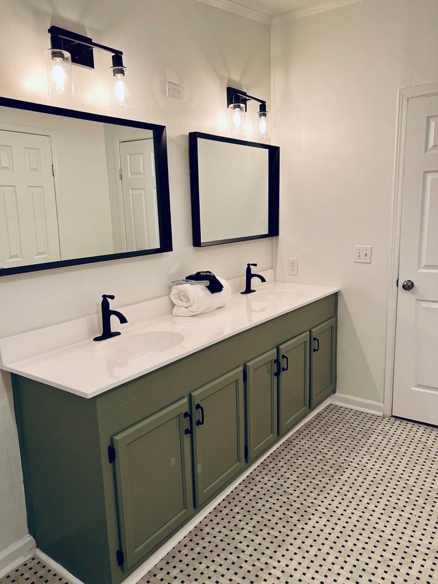 Master Bath with dual sinks, soaking tub, and stand up shower.