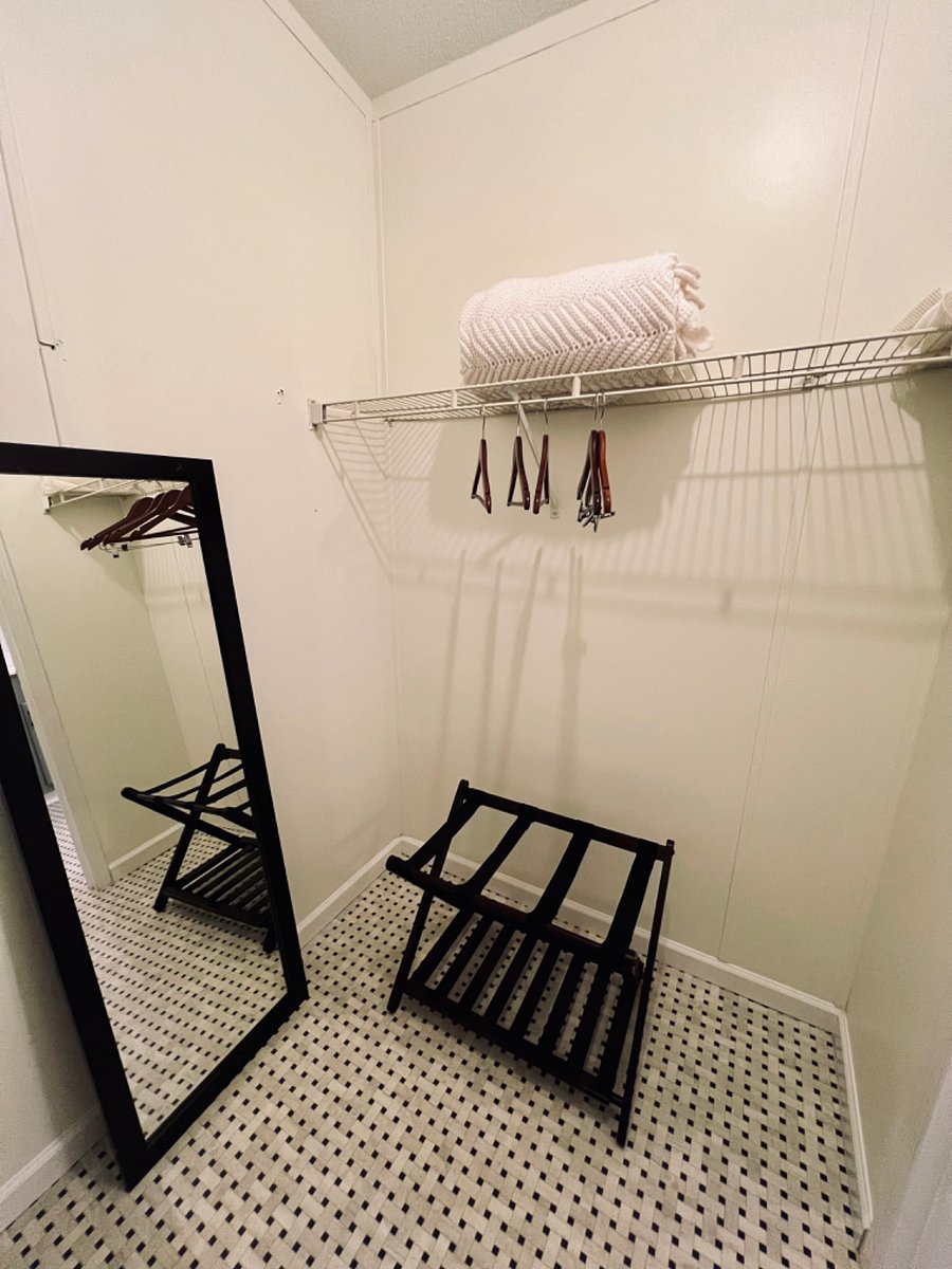 Master Bath Walk in closet, with full length mirror and iron.