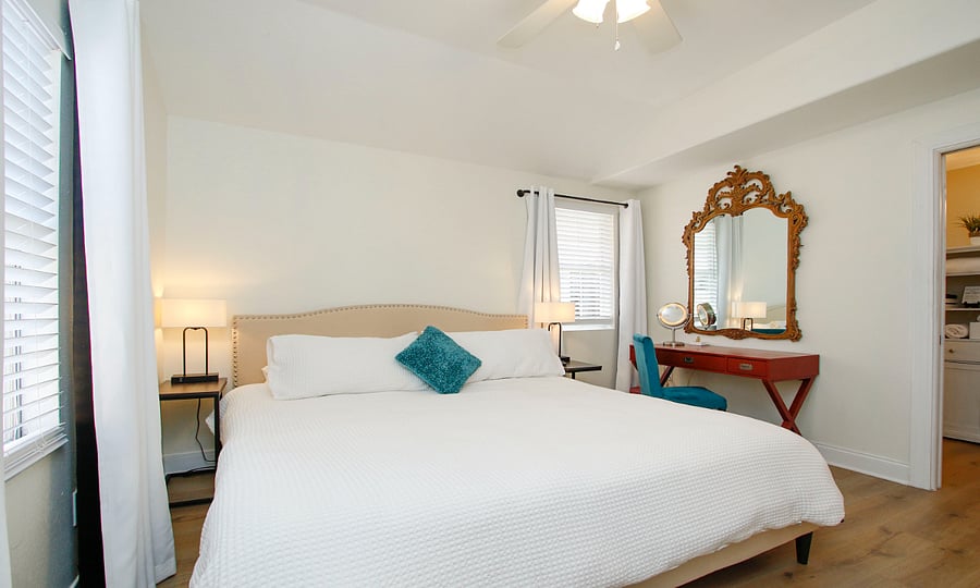 Primary bedroom with king bed and ensuite bath.