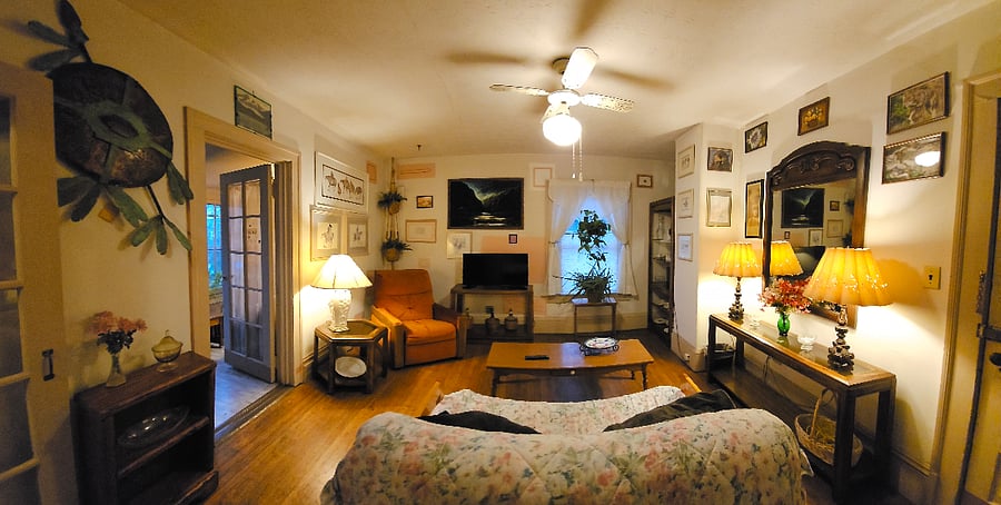 view of living room from bedroom doorway.