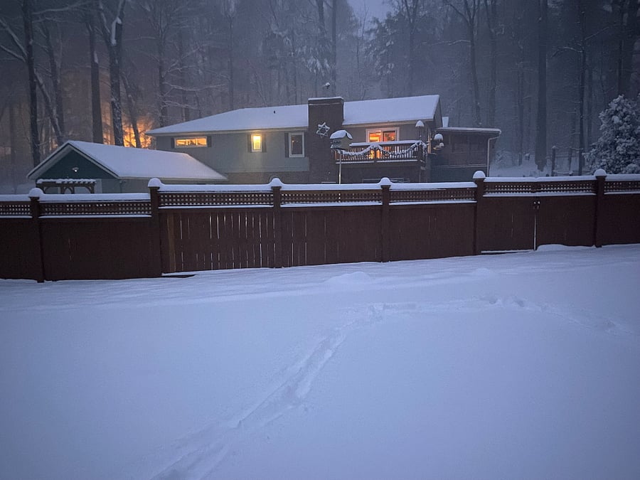 View of back deck in snow, taken from culdesac