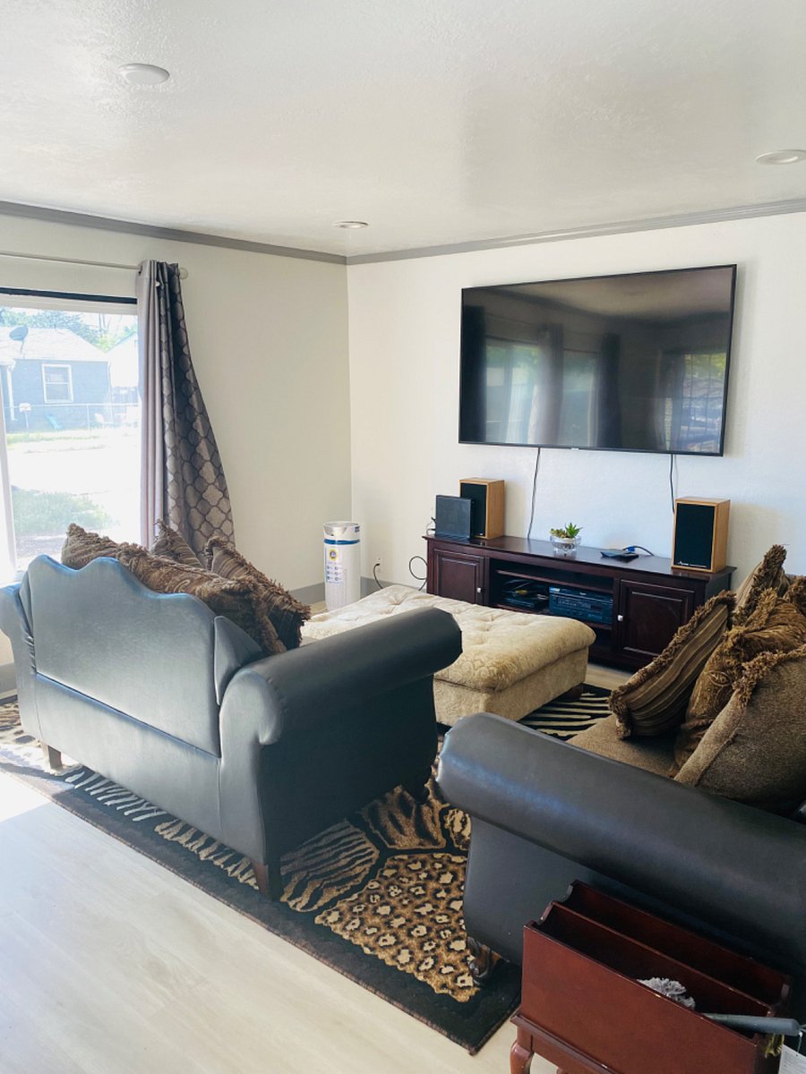 Spacious living room with 75 Samsung smart tv