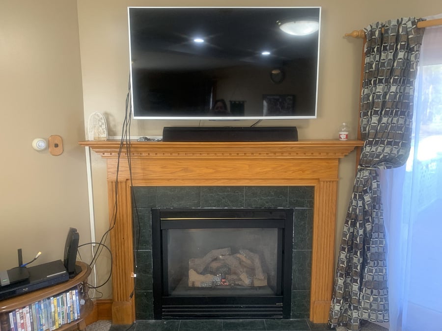 Smart TV above gas stove.