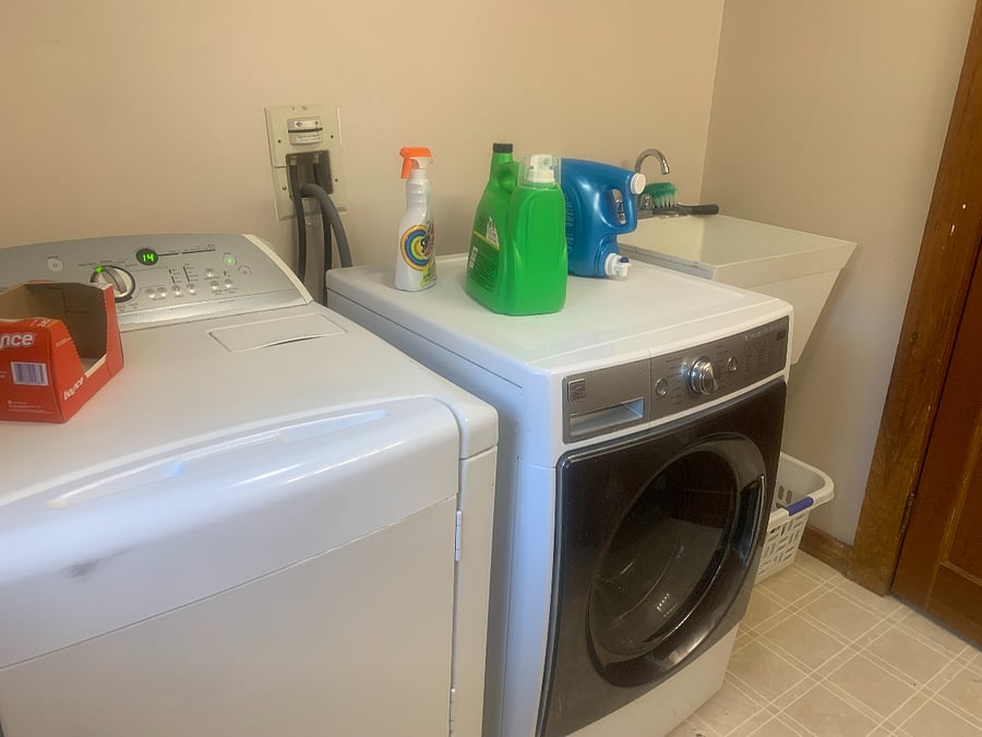 Large capacity washer and dryer and large sink in this half bath.