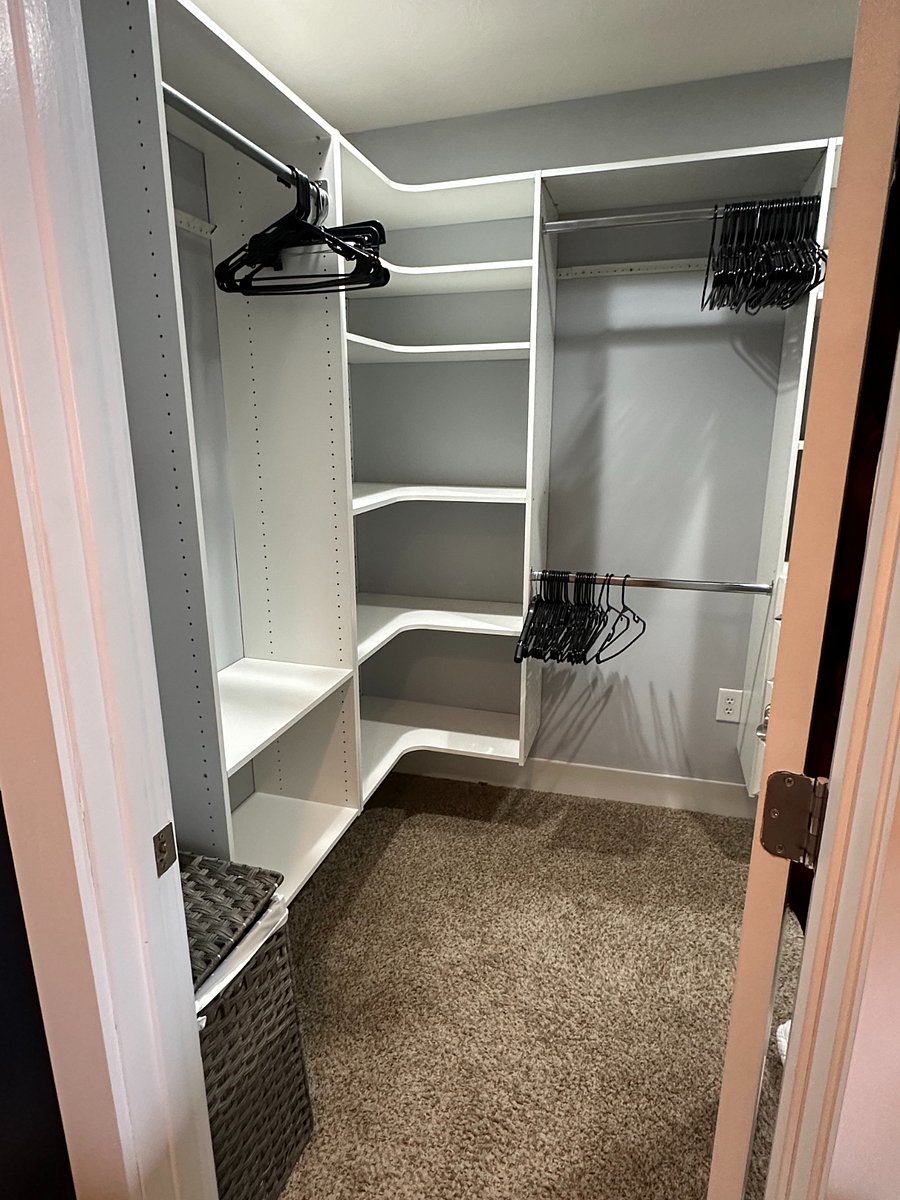 Walk in closet + vanity in master bedroom.