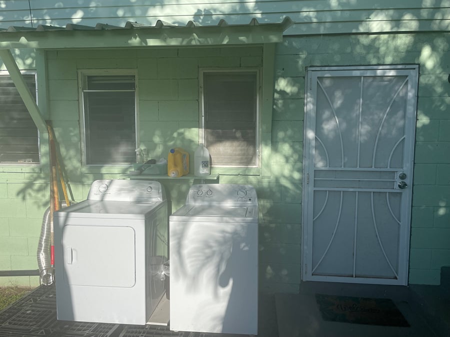 The washer and dryer are outside, which is rather common in Hawaii, and are shared by you and I.
