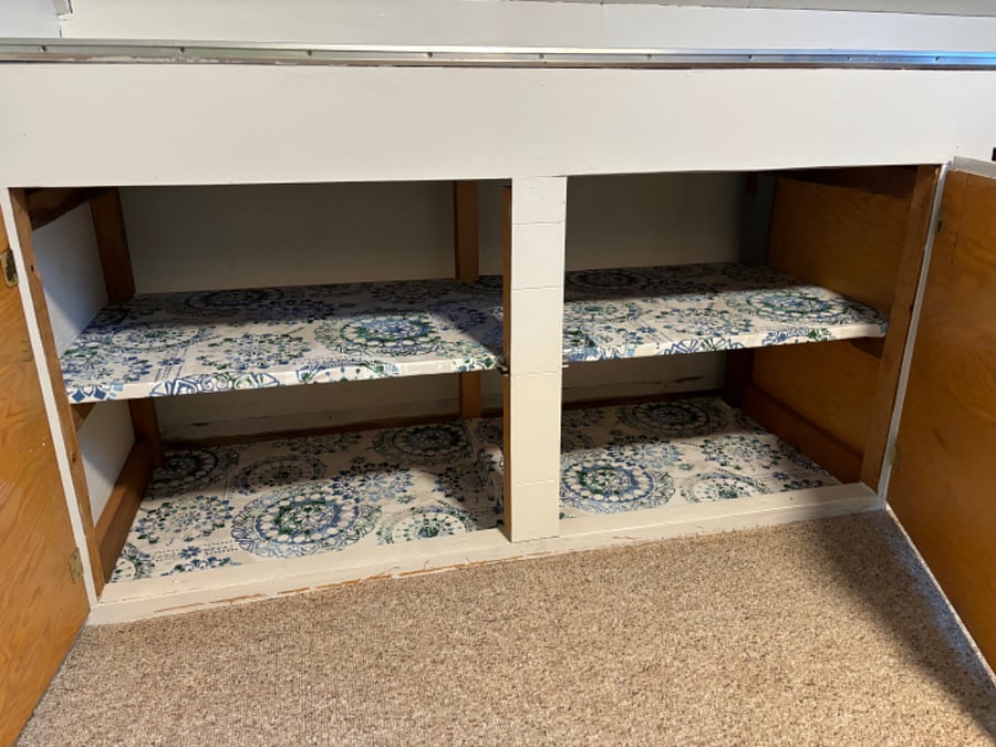 Upstairs: shelving in cupboard. Lots of storage.