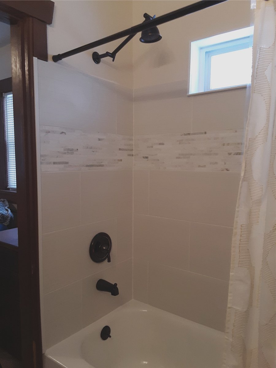 Full Bathtub with Extra tall shower-head