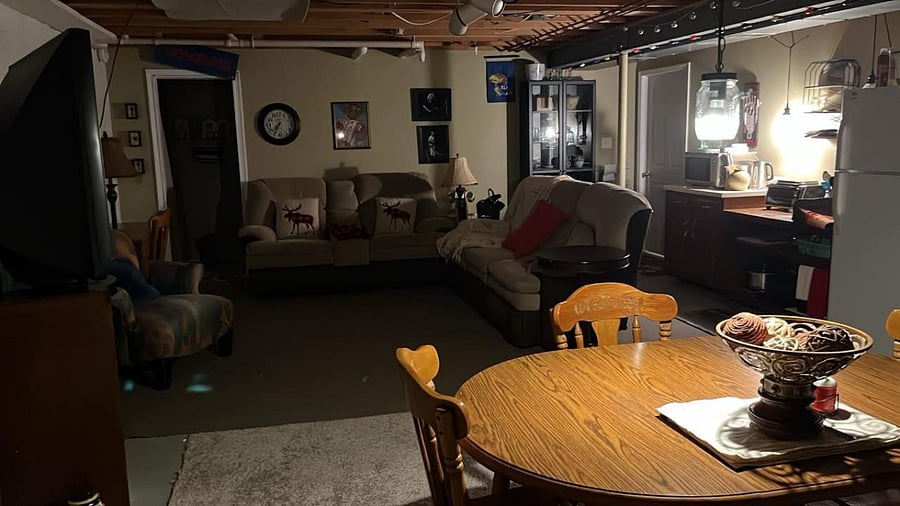 Large living space for exercising includes bike, rower, some weights, bands, etc.