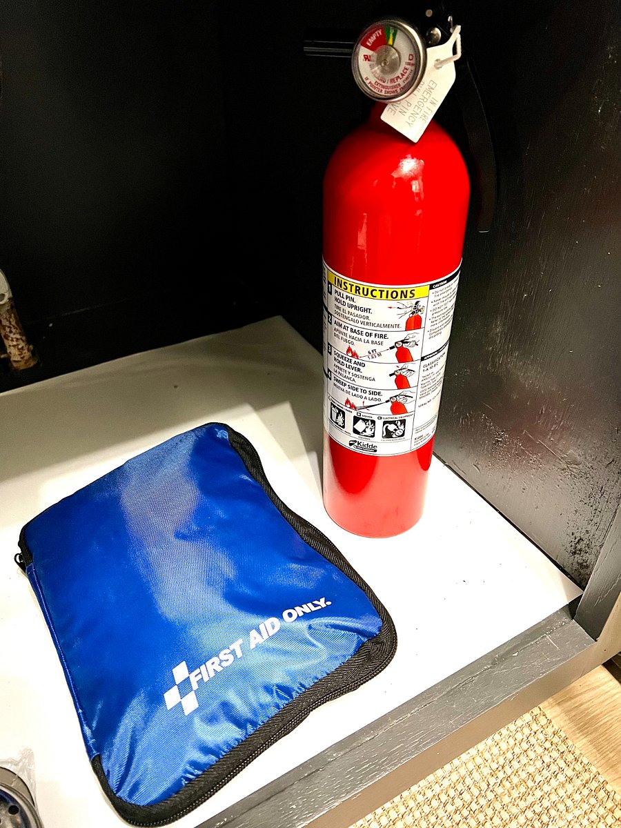 First aid and fire extinguisher in kitchen