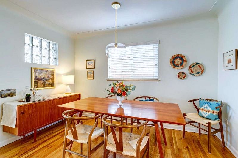 Main floor dining area with six-person dining table.