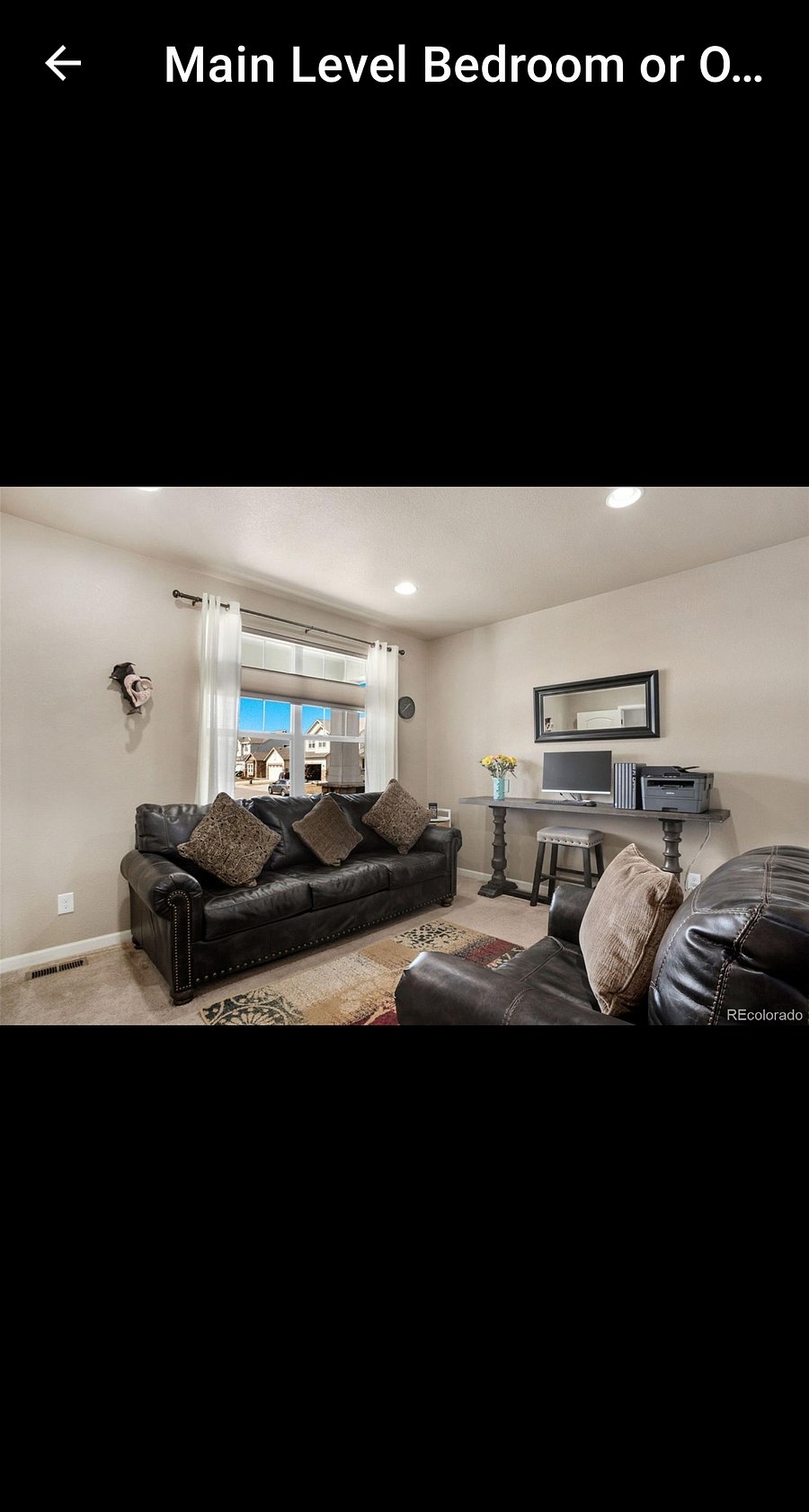 4th bedroom on main floor used as living room. Traveler may use space as their own private room, with or without the furnitire.
