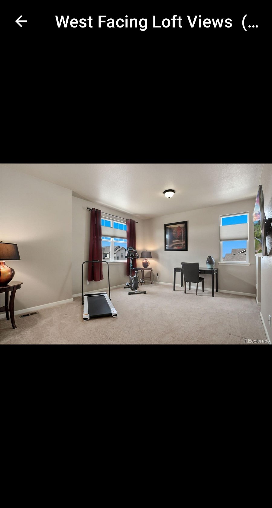 Spacious upstairs flex space, now has office furniture and piano