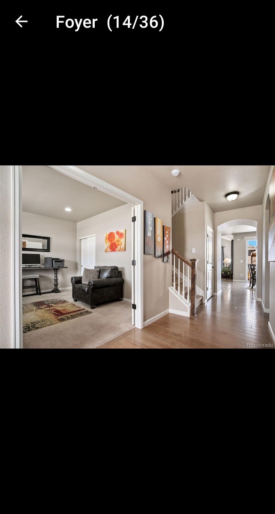 Entry way, den (with closet) technically a 4th bedroom. Furniture has changed.