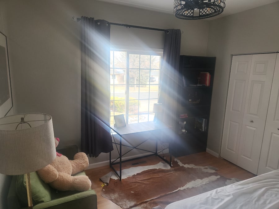 3rd upstairs bedroom currently furnished with desk, small couch, and daybed. Can be furnished with 2 twin beds or queen or convertible sofa.