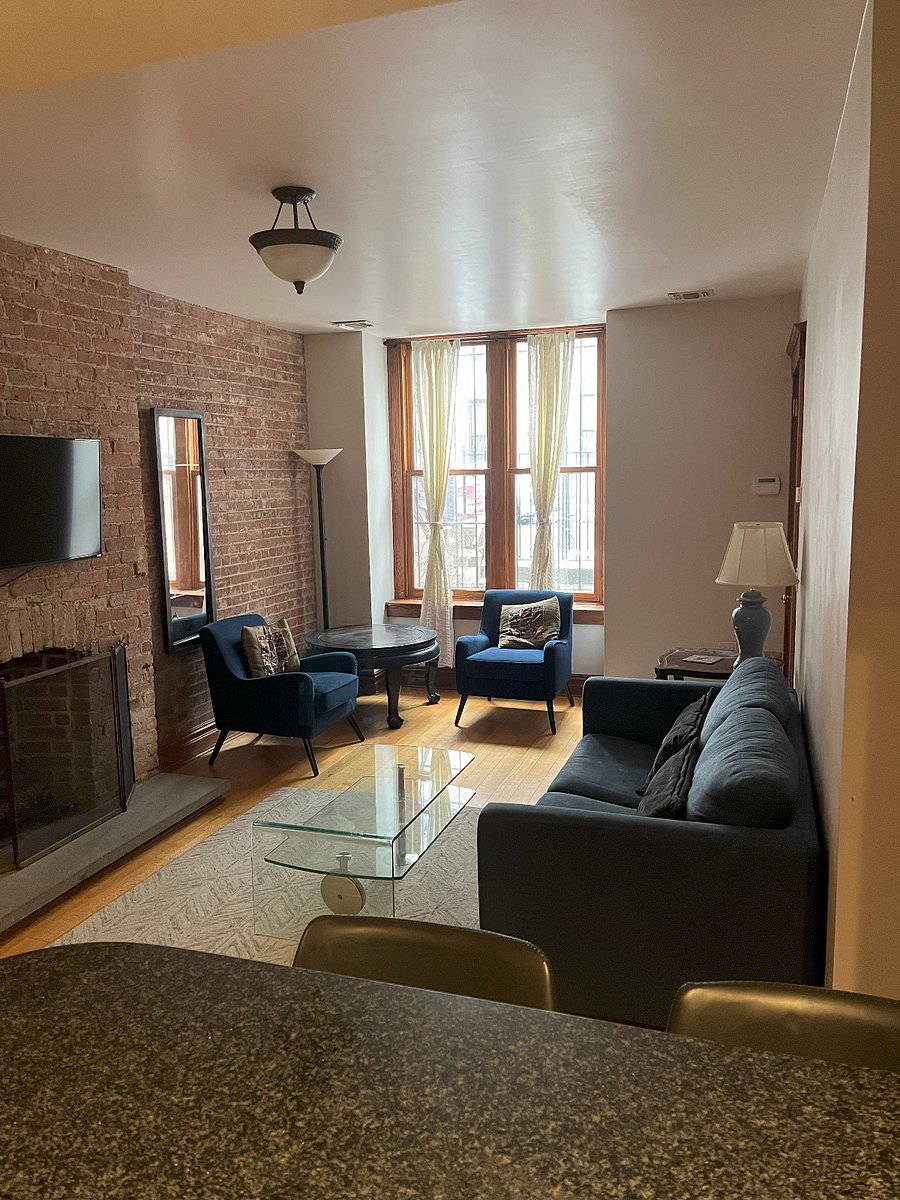 Living Room with Fireplace and TV