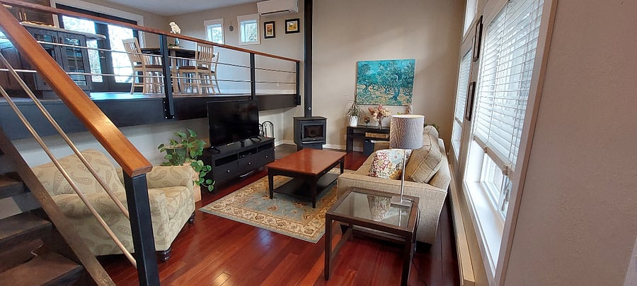 Bright, comfortable shared living room for relaxing after long shifts.