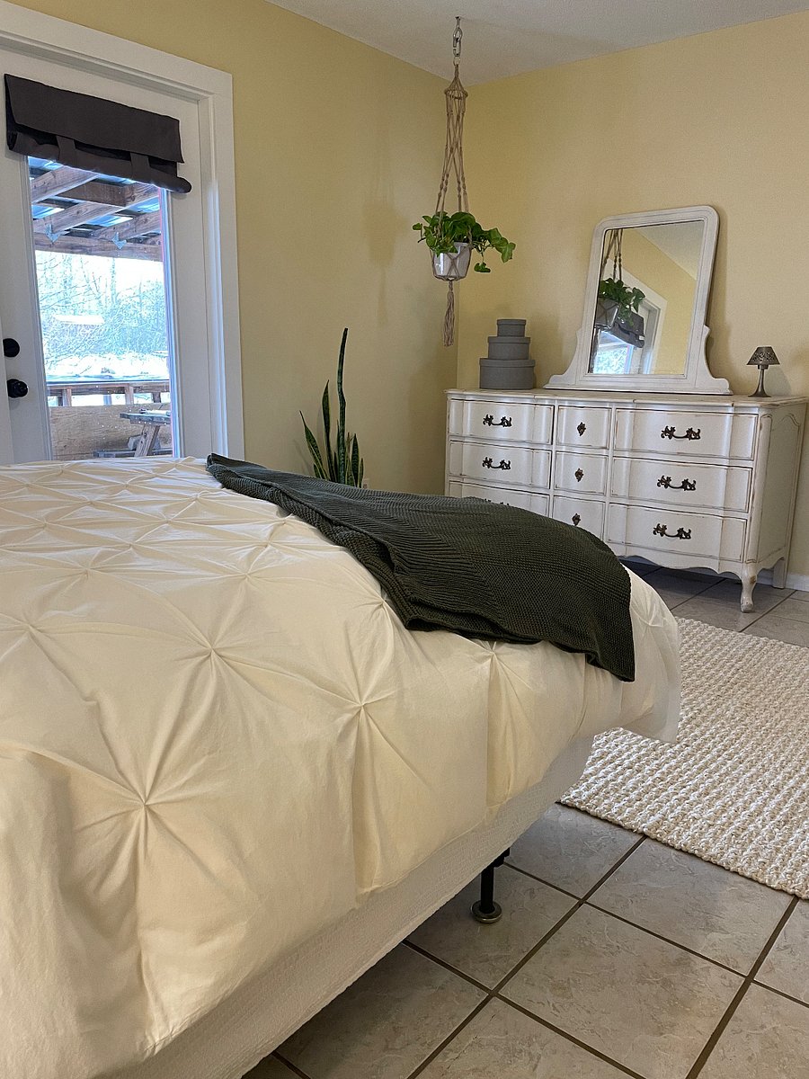 Full bedroom with French door to front deck.