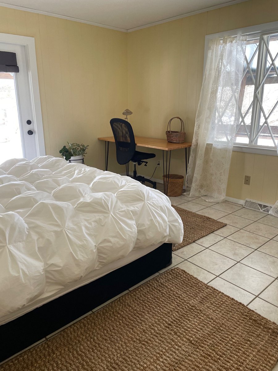 King bedroom with French door to front deck.