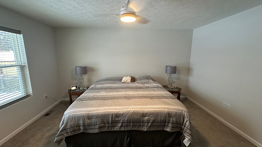 King Size Master Suite with walk-in closet, ceiling fan, and large full bath with linen closet