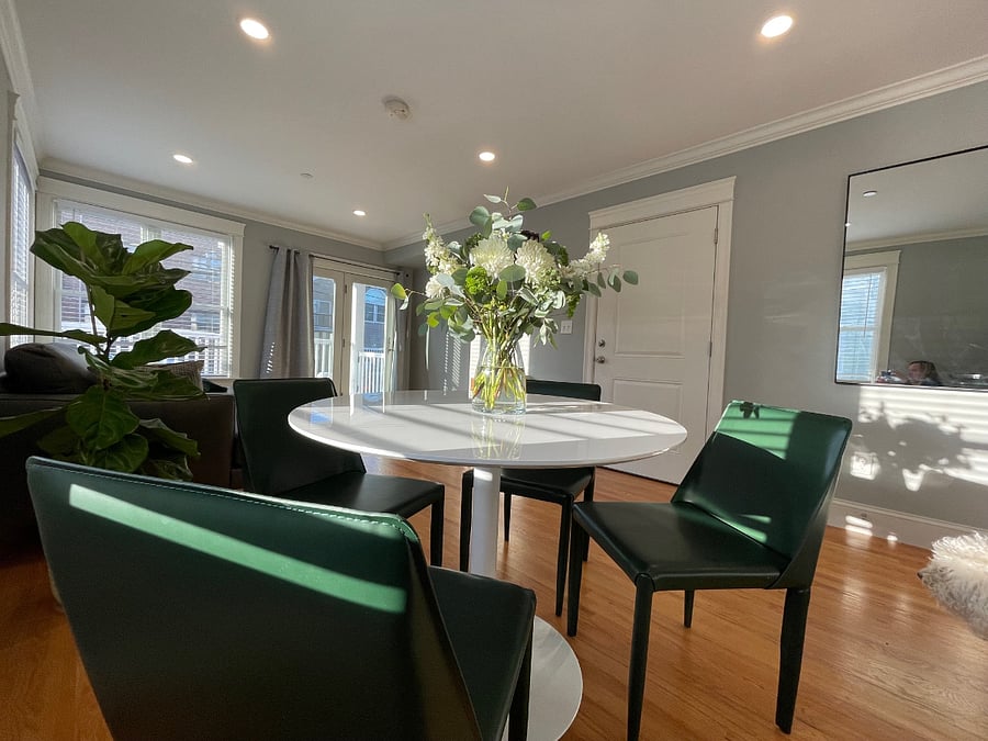 Entertain in style- white lacquer table with emerald green Italian leather seating for 4.