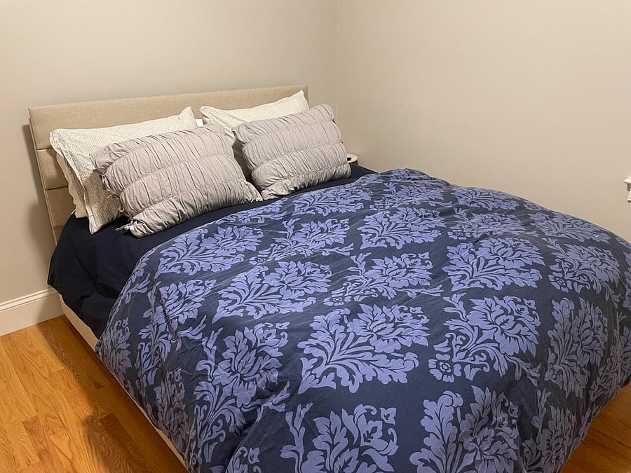 Queen Bedroom with a new Beautyrest mattress and twin size trundle. Both bedrooms have large closets.