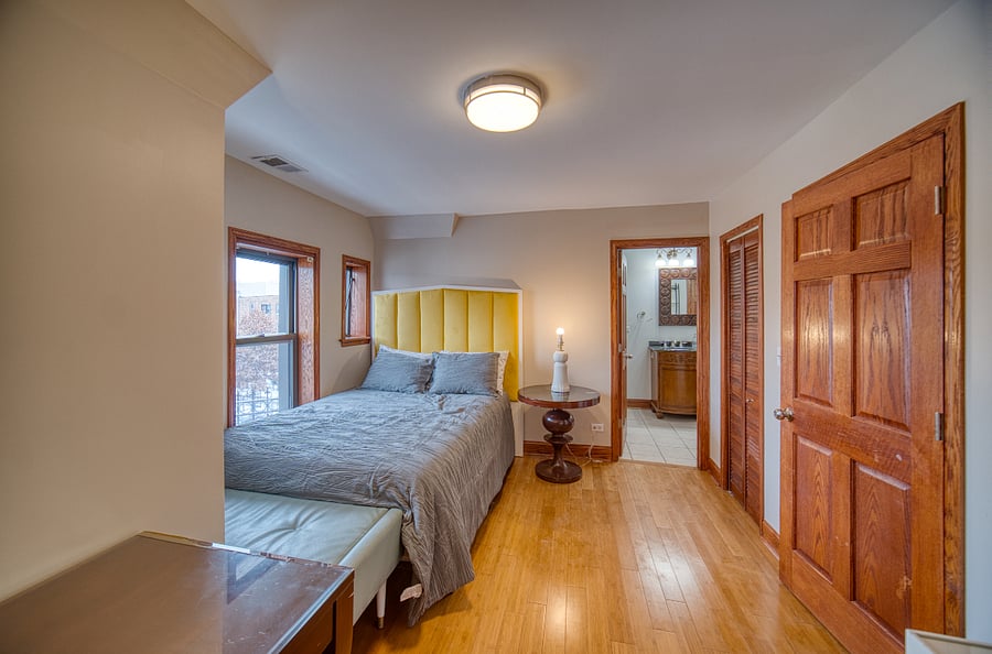 Queen bed with mini fridge