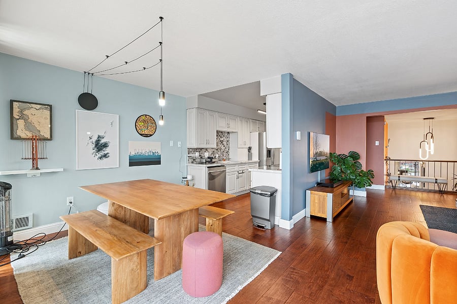 Dining Room is open to the kitchen and Family Room. The views of Lake Merritt from the balcony is behind this picture