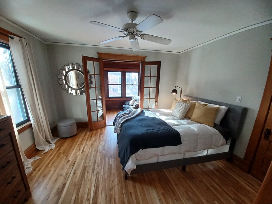 Room 2 - "A Little Gray, A Little Glam" - $1000/mo
Gray/Glam is a spacious living space that includes a south-facing porch with a desk with additional storage, and a comfy leather chair. Queen Bed, 2 Dressers, Closet.