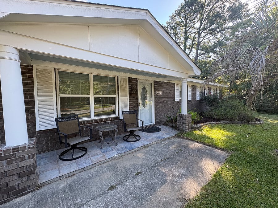 Front porch with rocking outdoor chairs