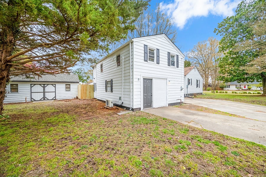 side yard view. Downstairs is a storage area used by the host, same as the shed.