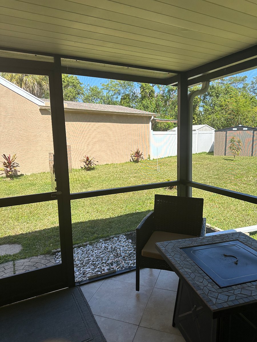 View of fenced in back yard.