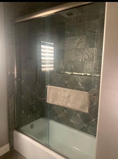 Hallway bathroom shower and tub combo