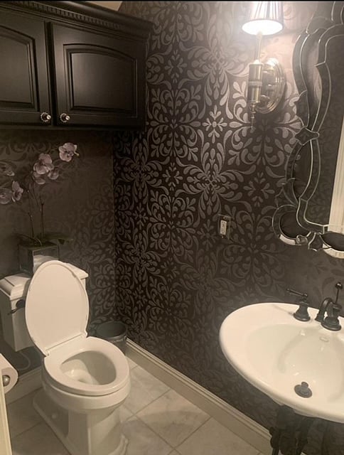 First level bathroom with walk in shower. 