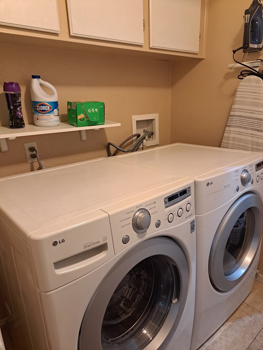 Access to washer and dryer and Ironing board