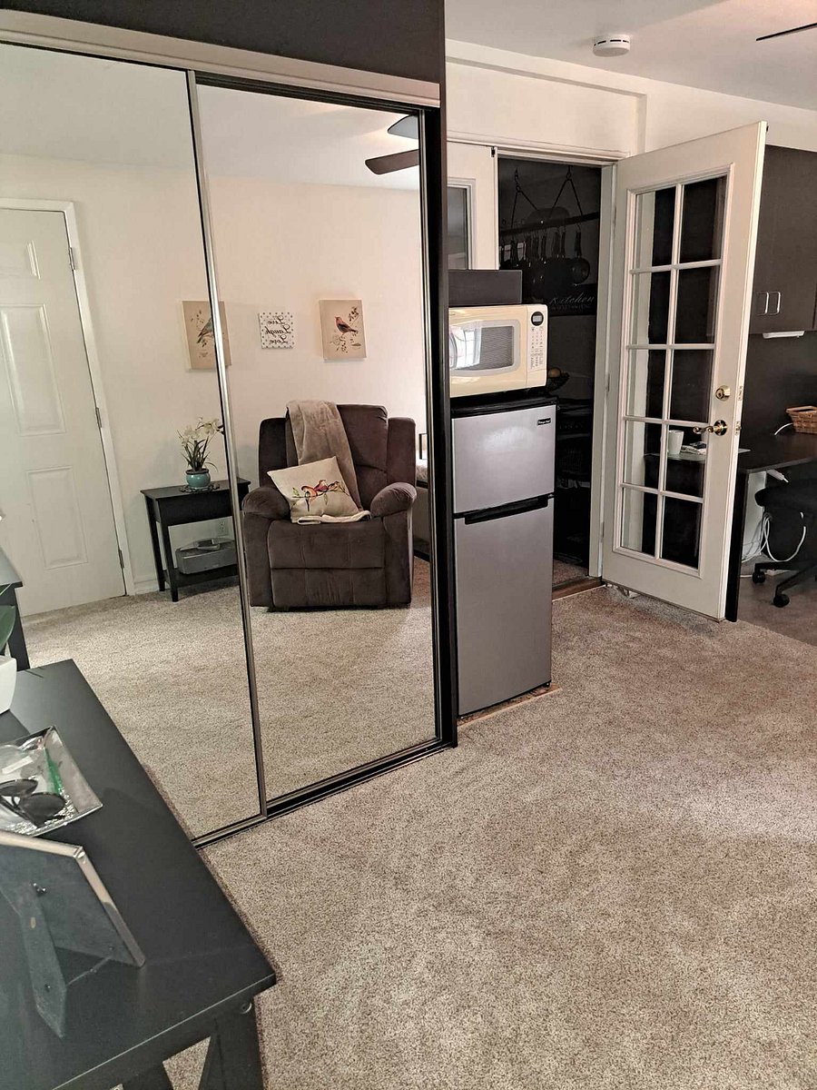 Full size mirror, Microwave, and mini refrigerator