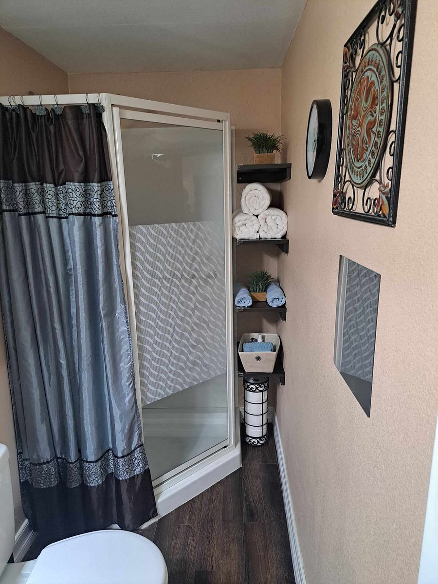 Shower with towels, misc. toiletries
