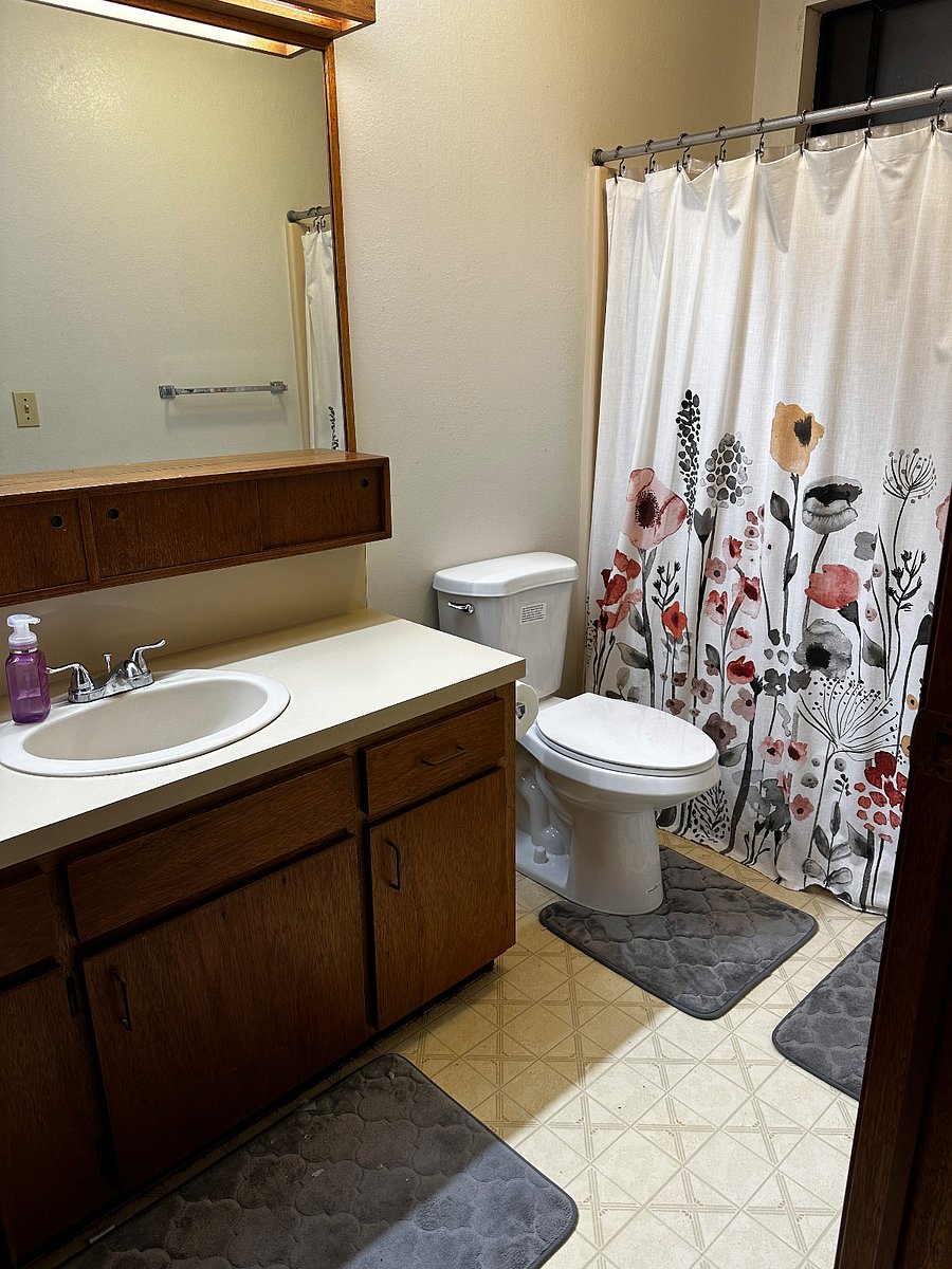 Full bathroom with tub and shower