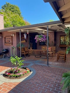 This is the back porch/seating area with all of Dads custom-made furniture