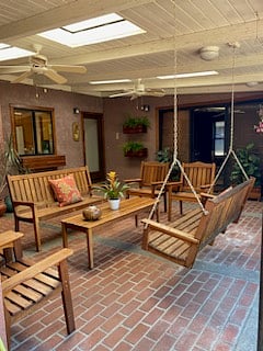 Back patio with custom Redwood furniture built by the man who built the house