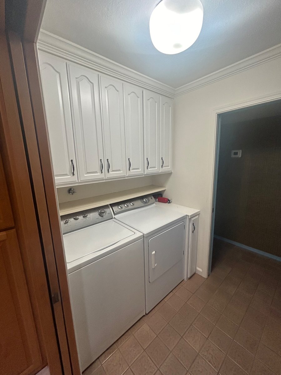 Laundry/mudroom with plenty of storage cabinets