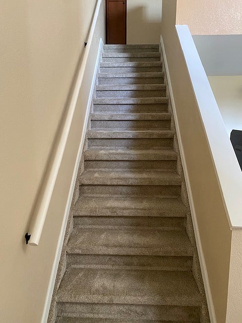 Stairs to loft bedroom and bath 