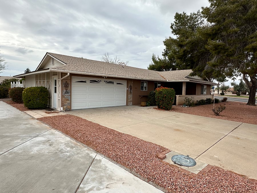 House exterior showing 2 car garage
