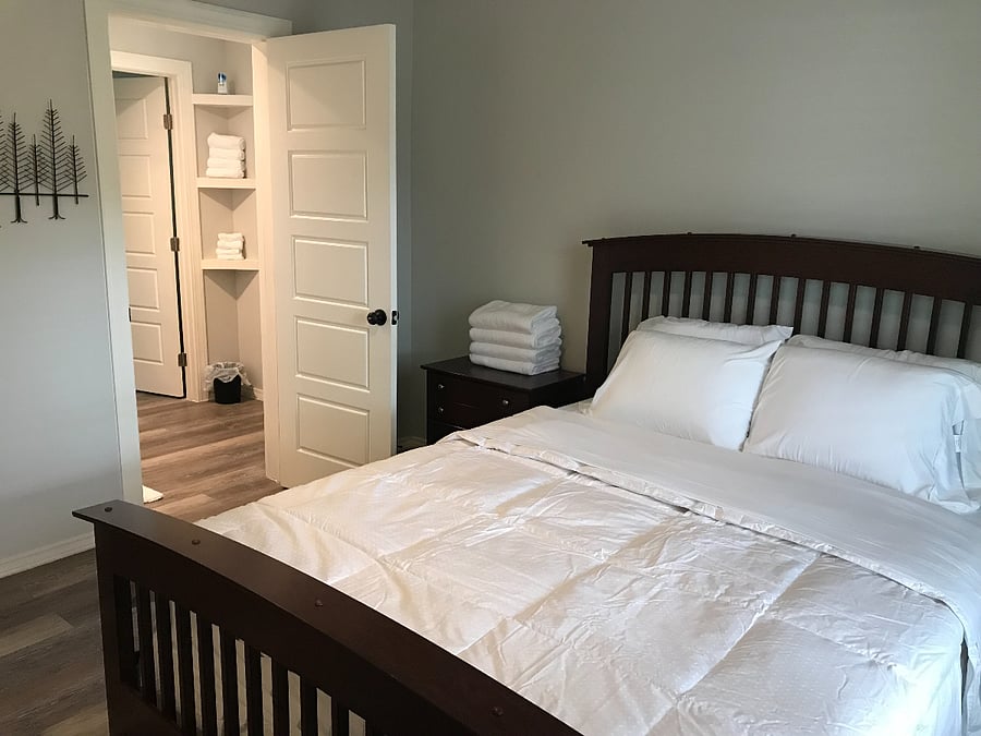 queen sized bed, front room
